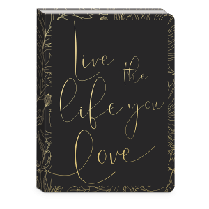 Decorative journal with golden botanicals live the life verbiage.