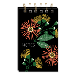 Spiral notepad featuring green garden aster design and metallic pen.