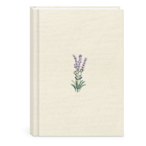Decorative fabric journal with delicate floral cream design.